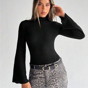 Black Ribbed Turtleneck Sweater